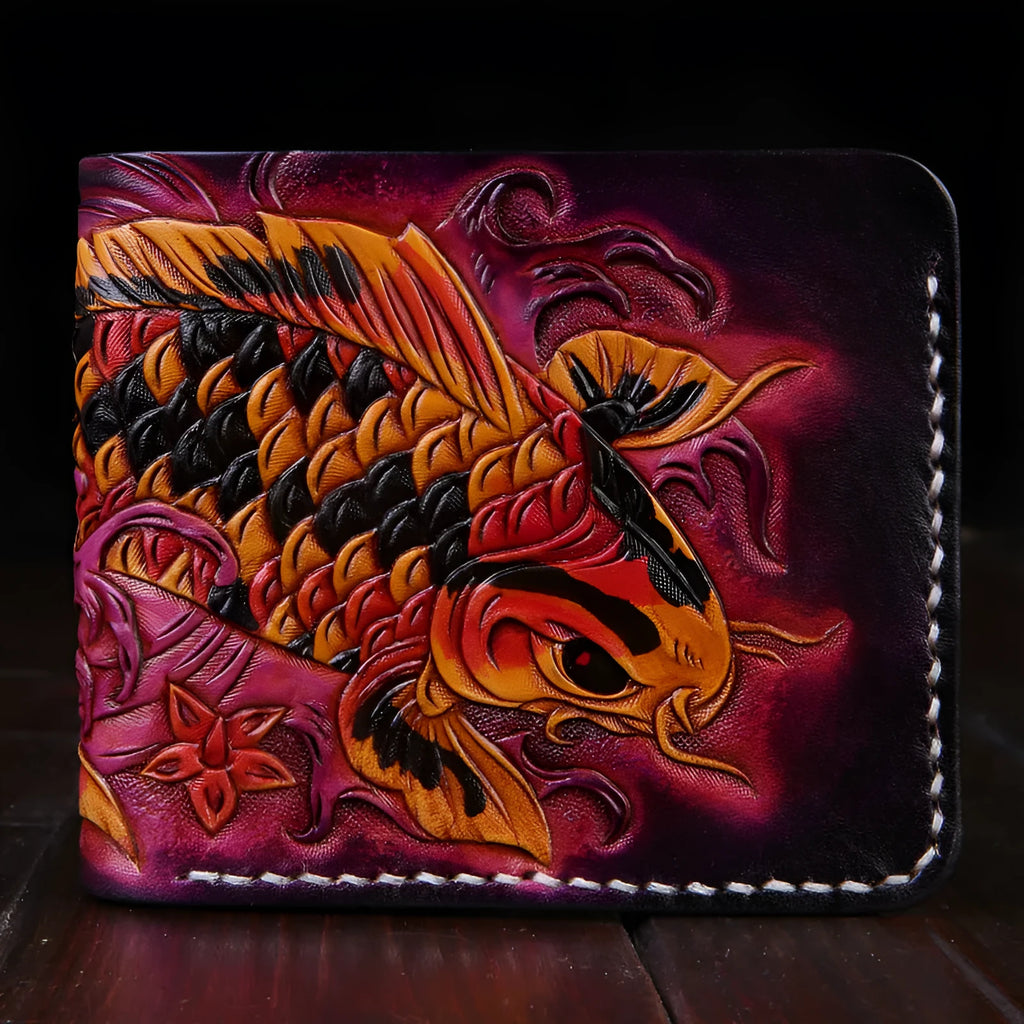 Men's carved leather short wallet in blue, showing open closure and compact size.