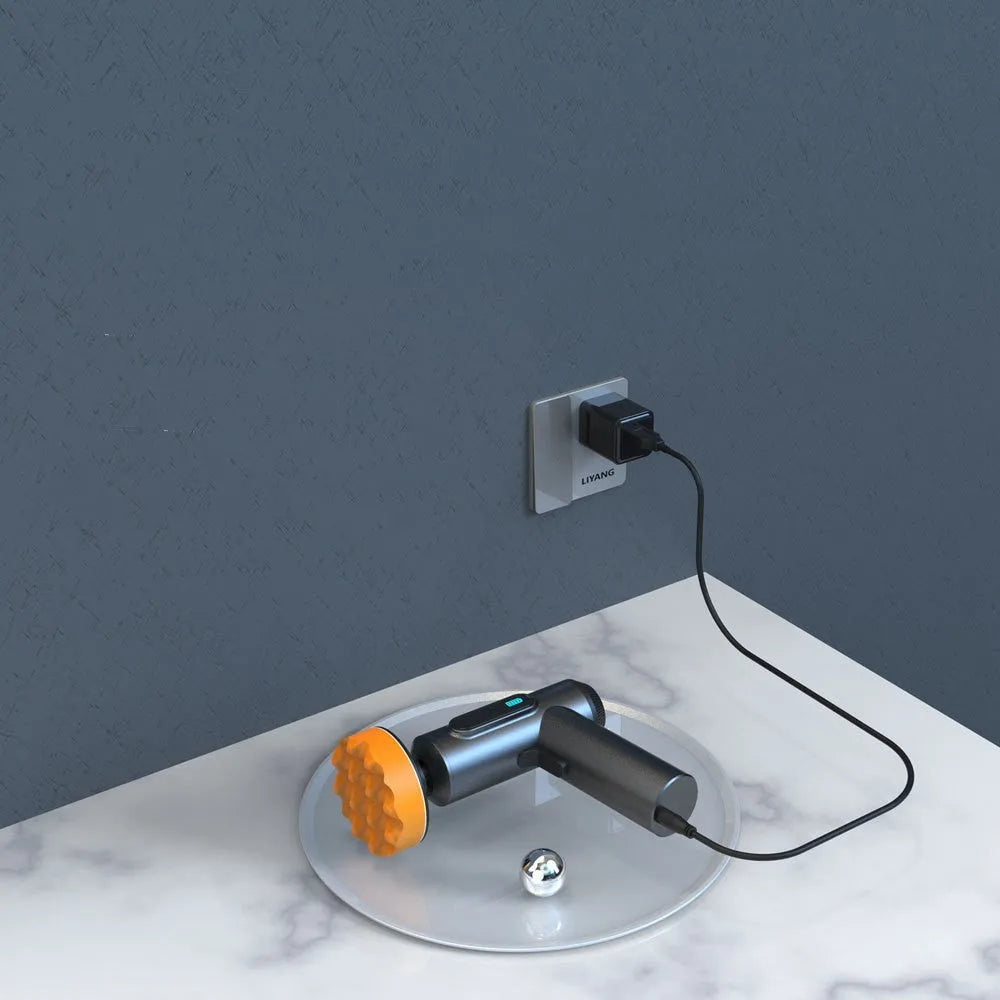 Cordless electric waxing and polishing machine with white body and black grip on a grey surface.