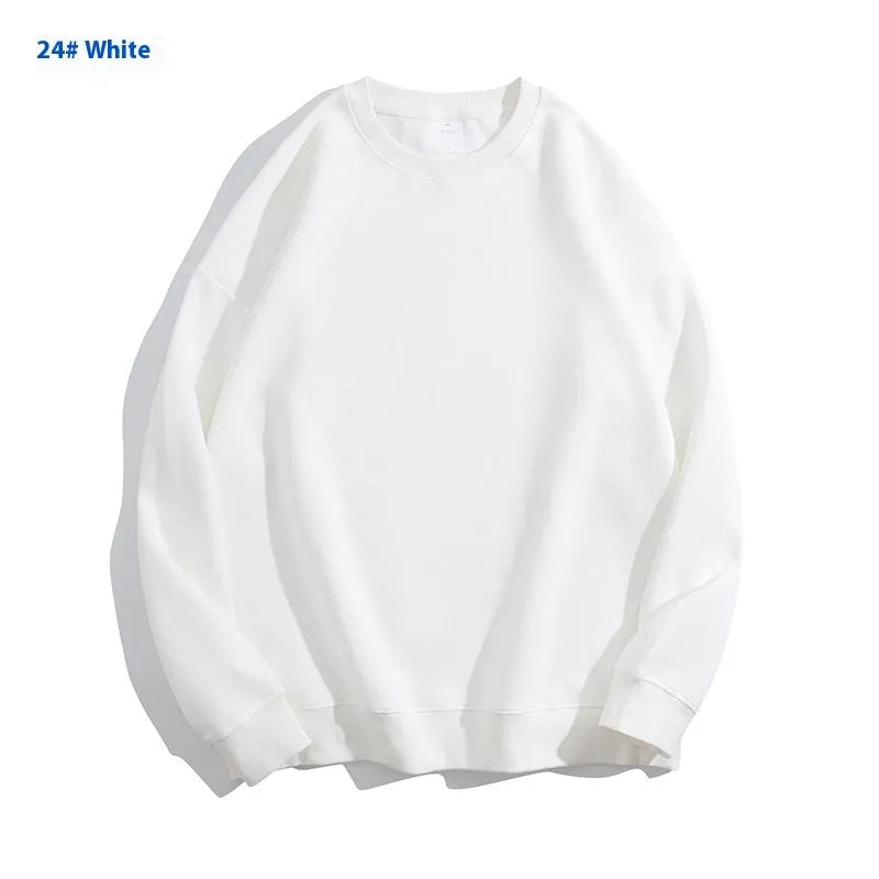 Women's loose fit cotton off shoulder sweater in a solid colour, showing round neck and long sleeves.