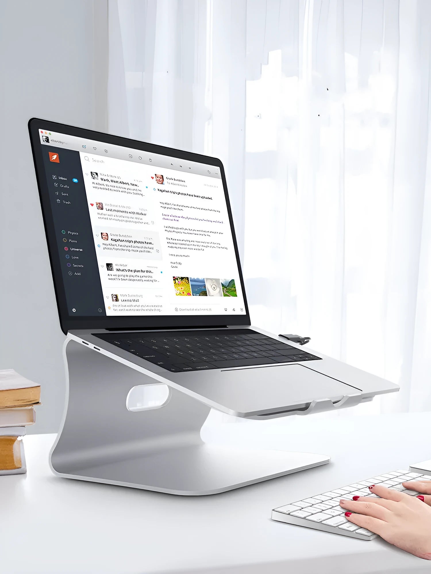 Aluminium alloy rotary cooling bracket for laptops in grey and silver colours.