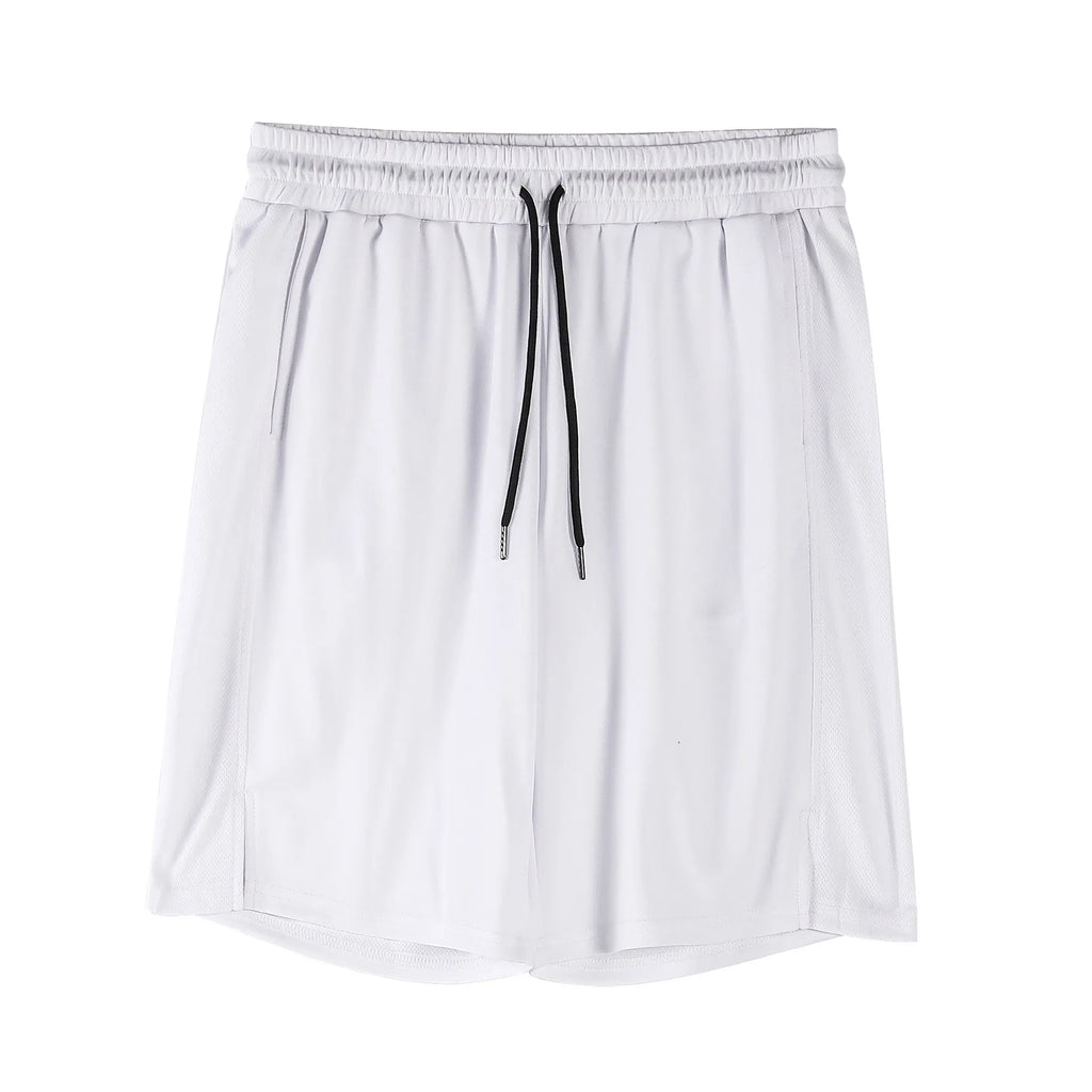 Man wearing loose-fitting black quick-dry mesh fitness shorts with an elasticated waistband.