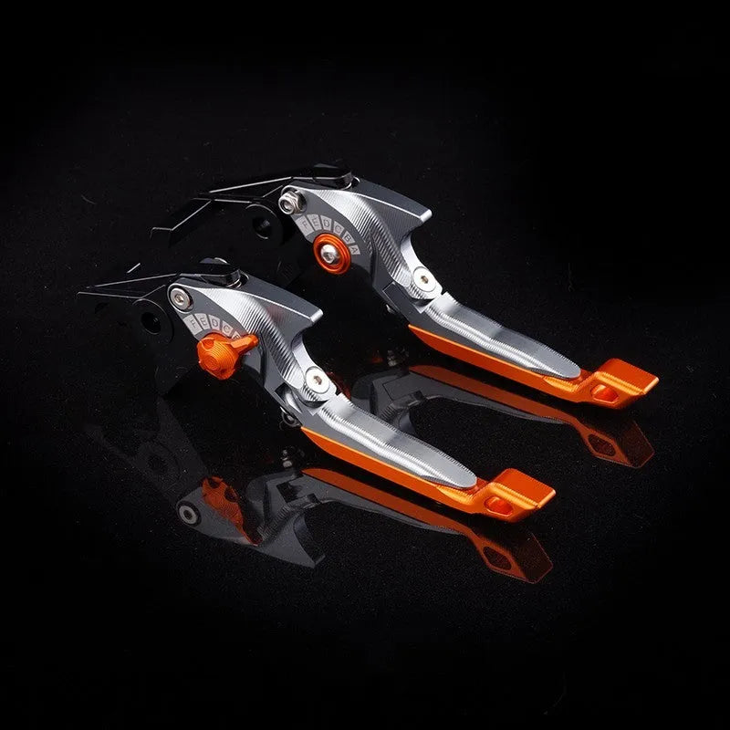 Pair of anodised aluminium motorcycle brake and clutch levers with six-speed adjustable length mechanism