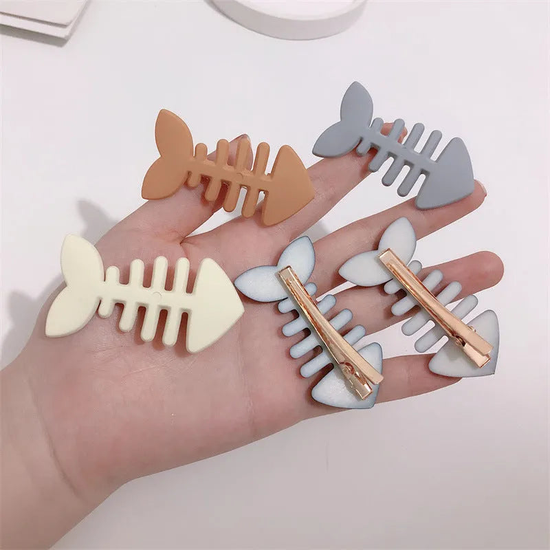 Minimalist fishbone design hair barrette in candy colour with duckbill clip