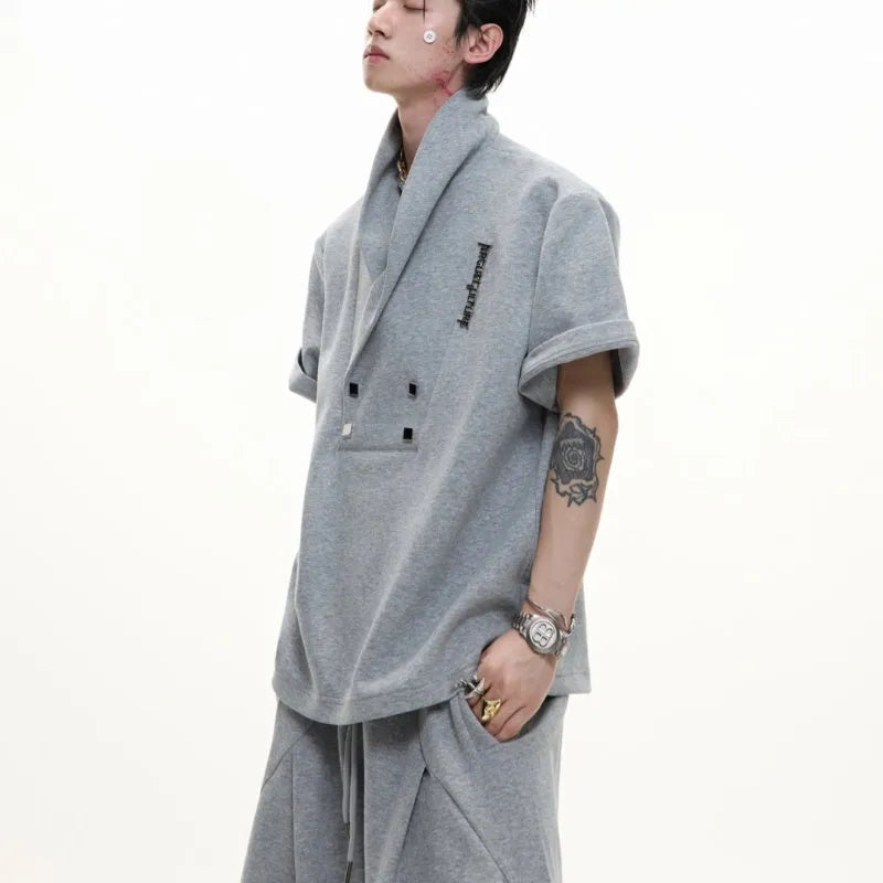 Men's dark grey V-neck padded shoulder short sleeve jacket with metal details and matching shorts