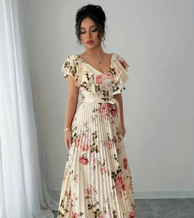 Apricot floral print women's dress with V-neck, ruffled sleeves, and a high-waisted swing skirt.