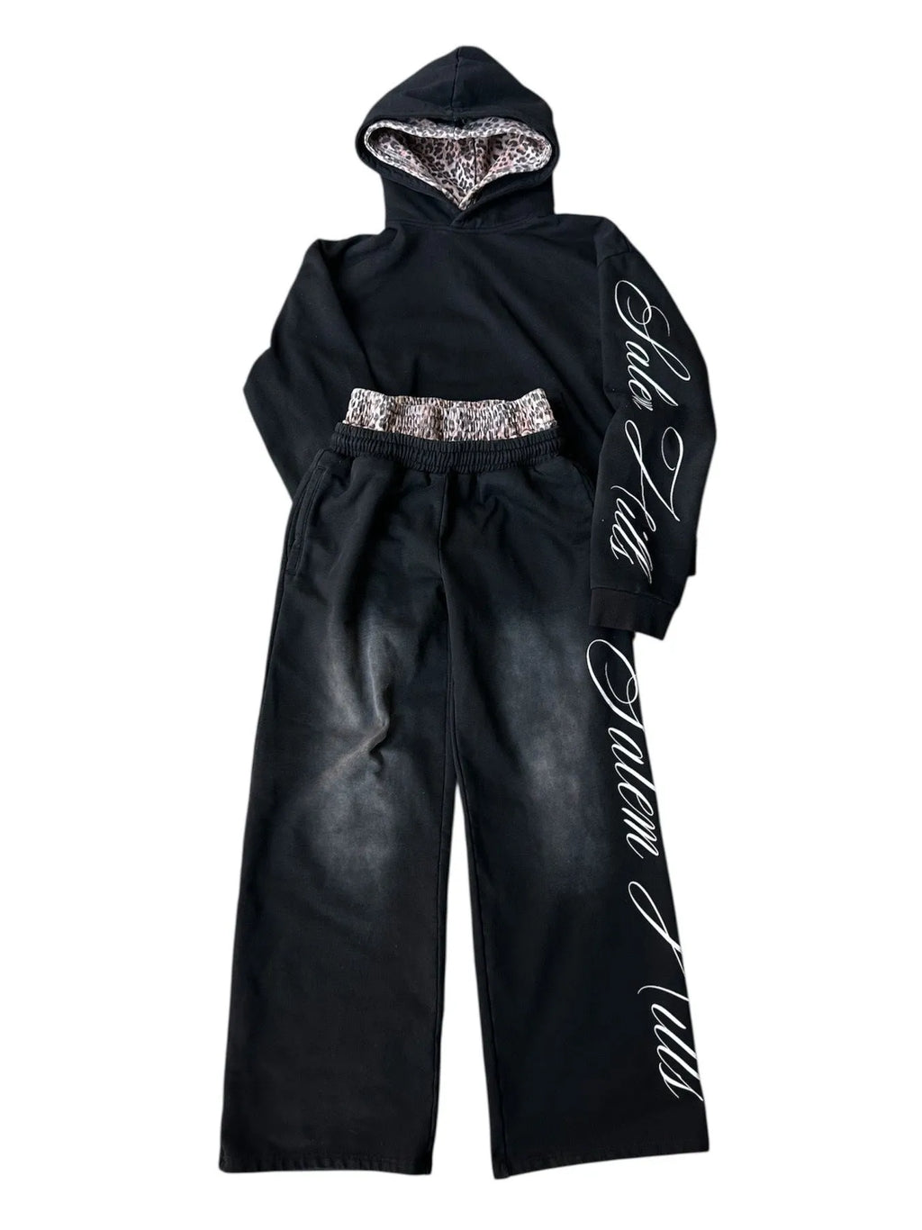 Adult male punk print hoodie and pants leisure suit set in fleece-lined polyester.
