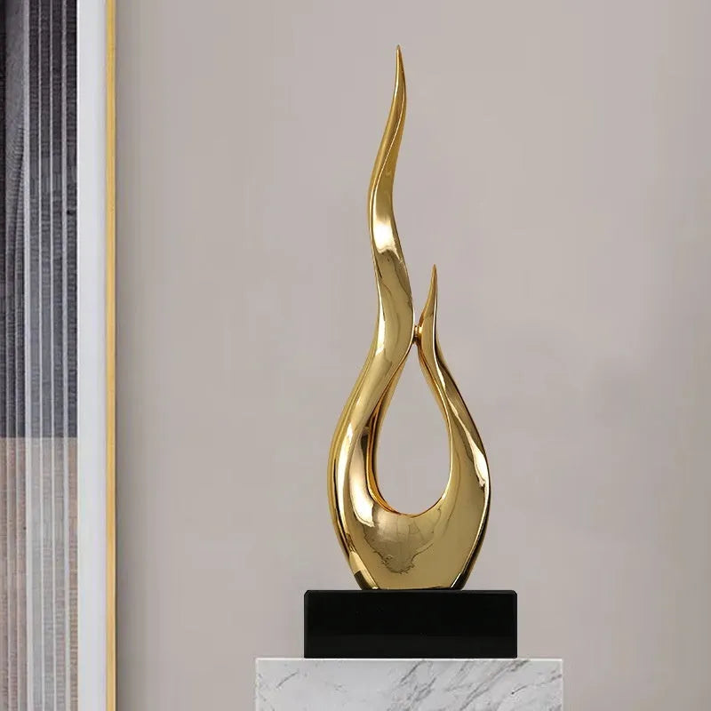 Modern minimalist plastic resin festival decoration ornament in bright gold.