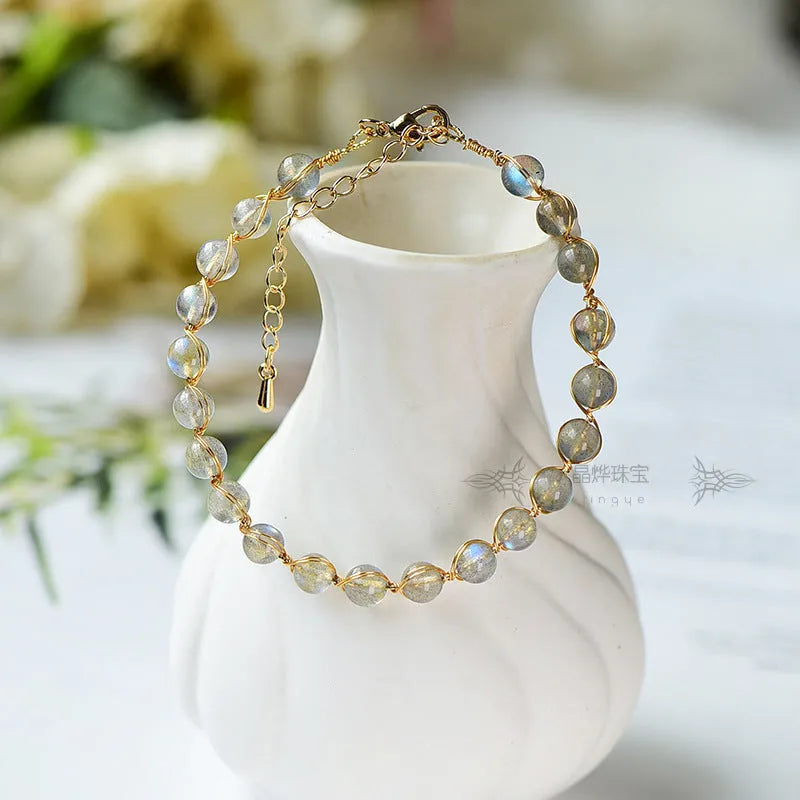 Blue moonstone bracelet with 6mm beads and 14K gilded metal setting