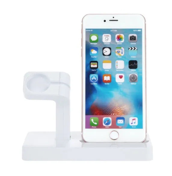 White Apple Watch and iPhone 2-in-1 charging dock station on a wooden desk.