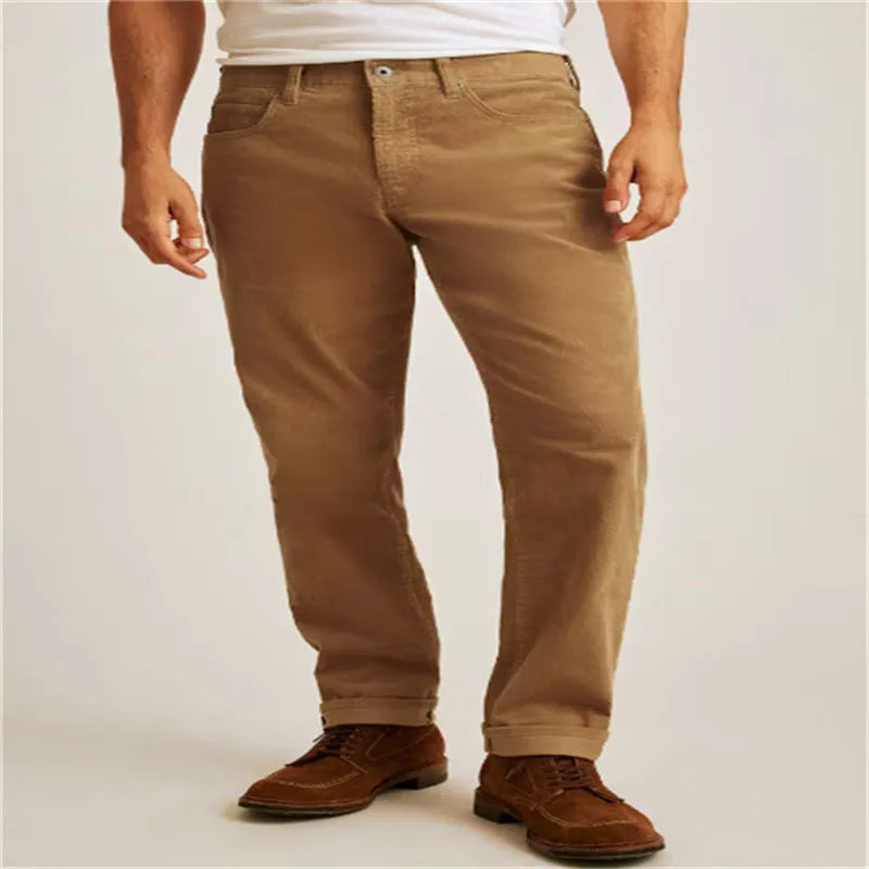 Corduroy loose fit straight-leg casual trousers in Army Green colour on a hanger.