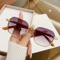 Women's fashion glasses with wood grain detailing on gold alloy frames