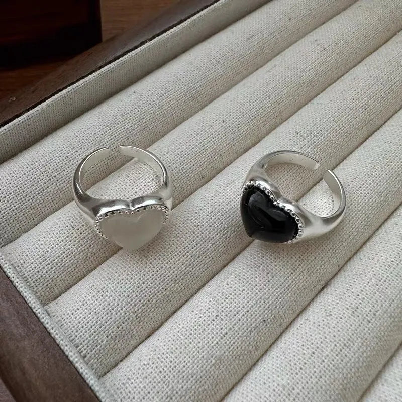 S925 sterling silver adjustable ring with black agate heart design in niche setting