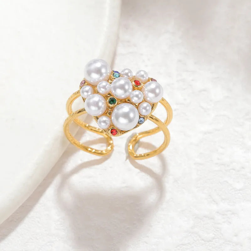Adjustable stainless steel women's ring with pearl and zircon in round and heart shapes