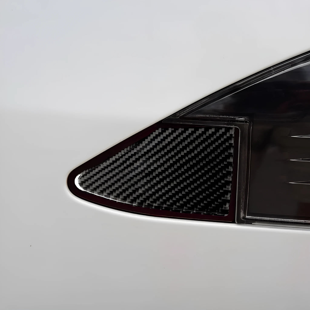 Carbon fibre USB charging port decorative sticker with 3M adhesive backing.