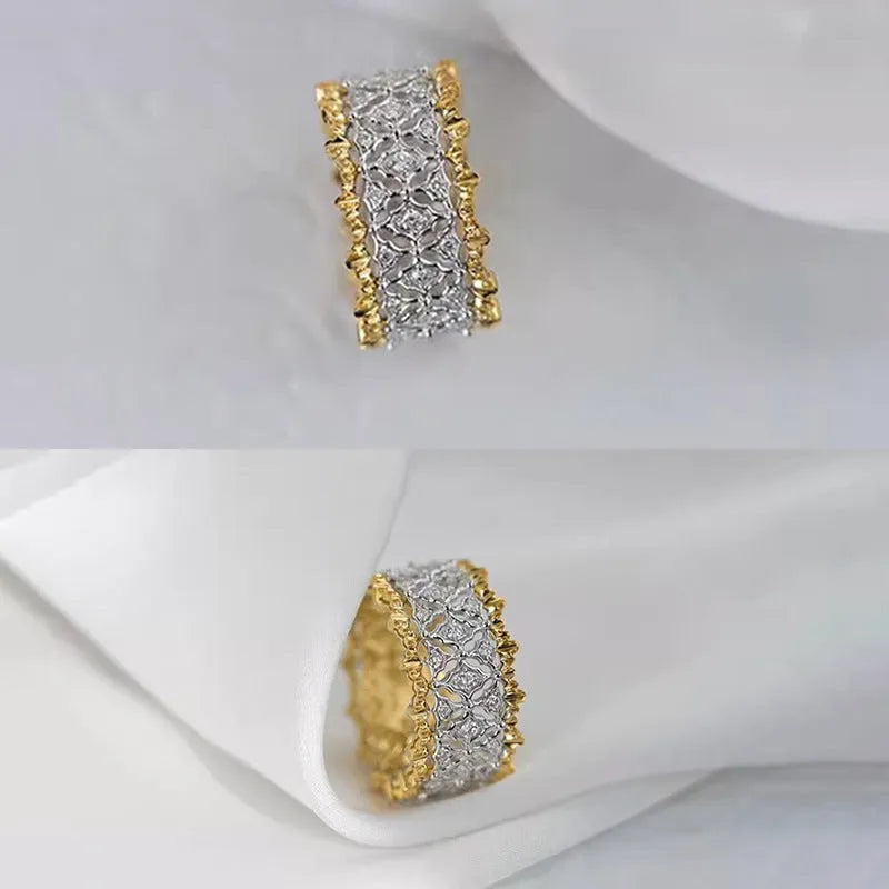 Geometric two-tone zircon copper ring showing electroplated finish and round stone elements.