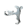 Zinc alloy archery release aid with a two-axis harpoon clip and stainless steel spring mechanism.
