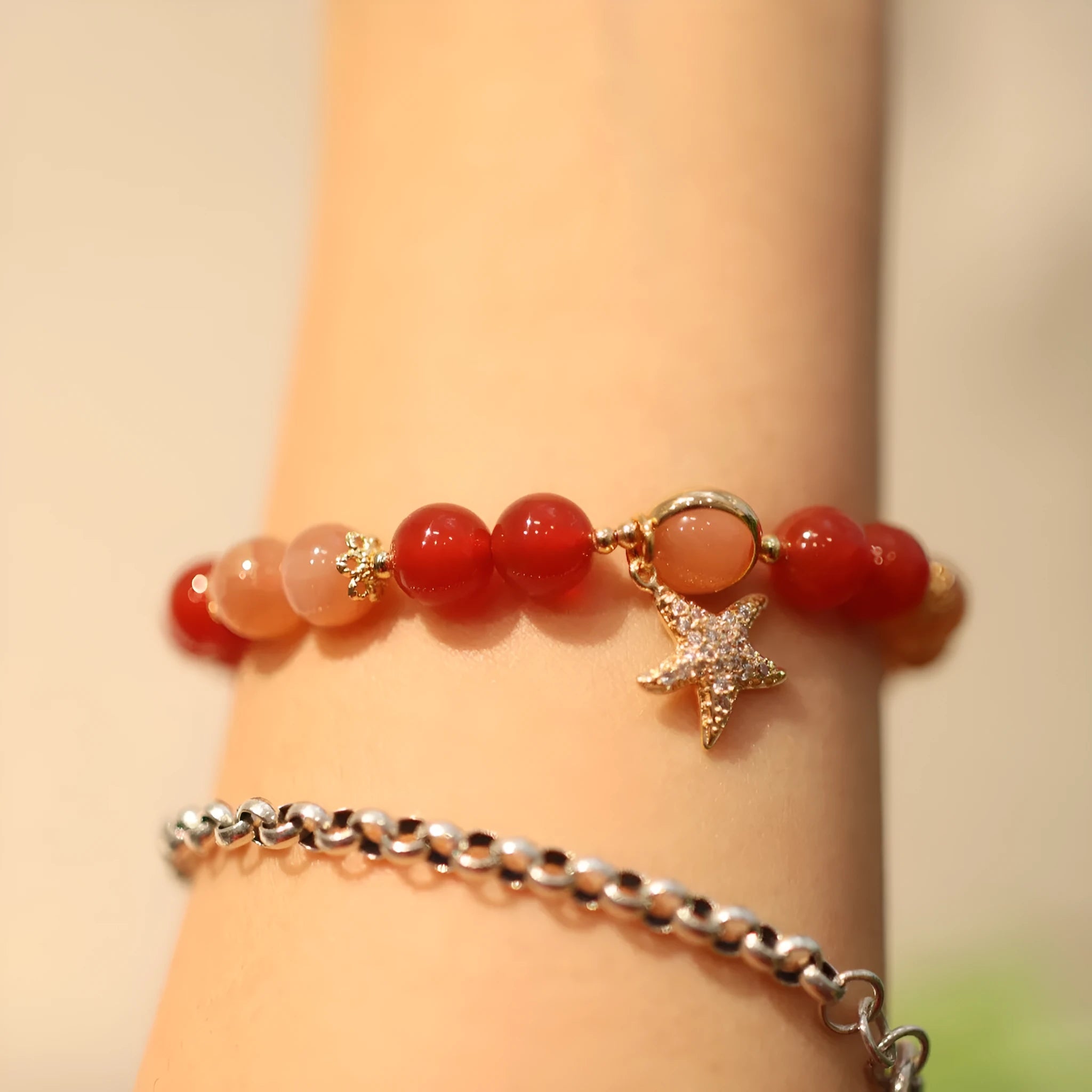 Handmade women's red agate bracelet with 8mm stones and ethnic star design featuring Xiangyun elements