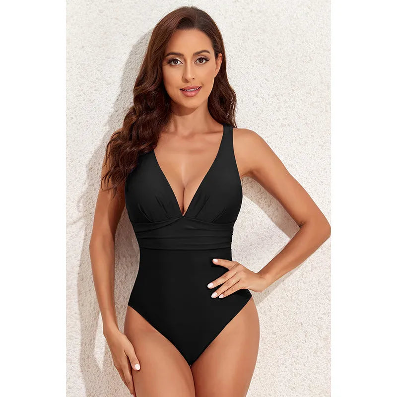 Women's minimalist cross-shoulder one-piece swimsuit in solid colour