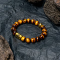 Little Lion ethnic style bracelet with Bodhi seed construction and geometric patterns in black and white