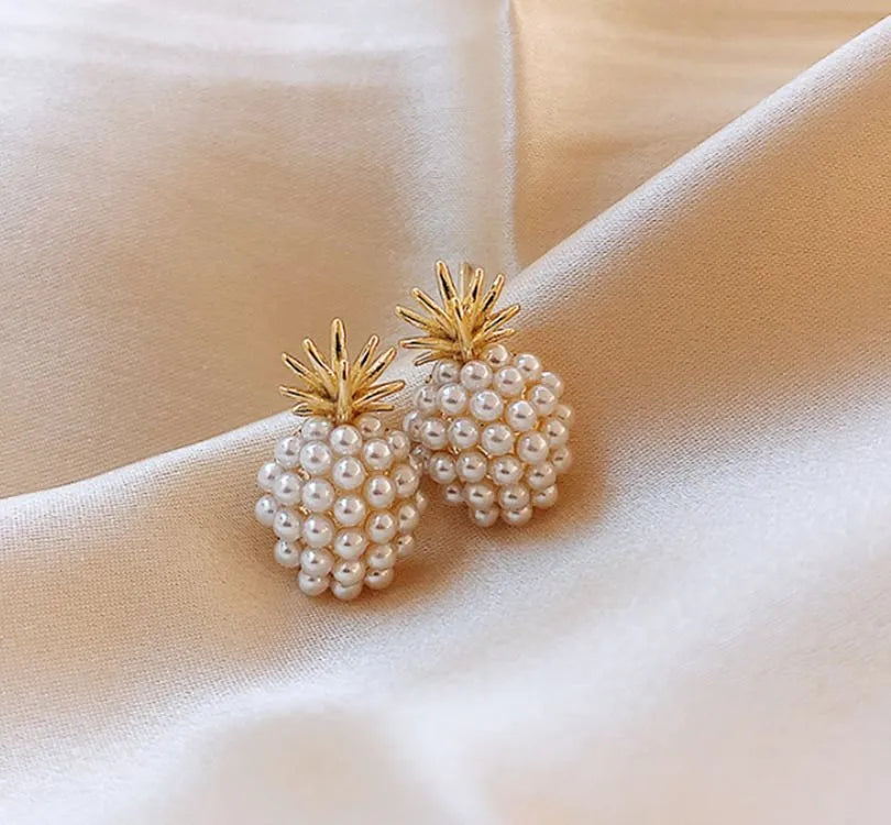 Korean style alloy earrings with pineapple and starfish motifs in gold colour, featuring inlaid artificial gems