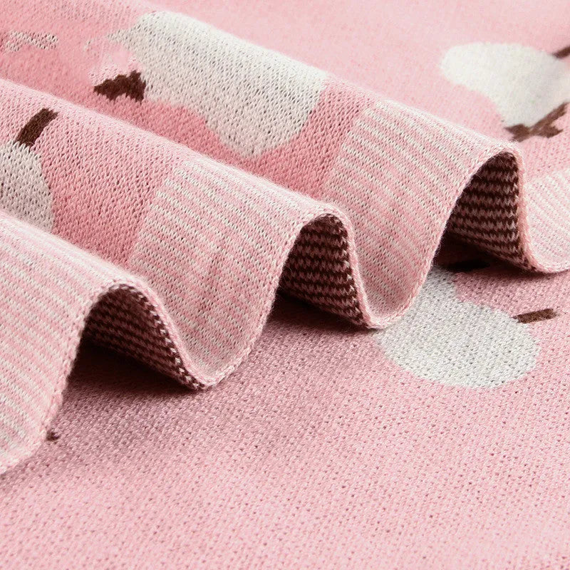 Grey and pink 100x80 cm baby sheepskin blanket made from 100% cotton fabric for cot and pram use.