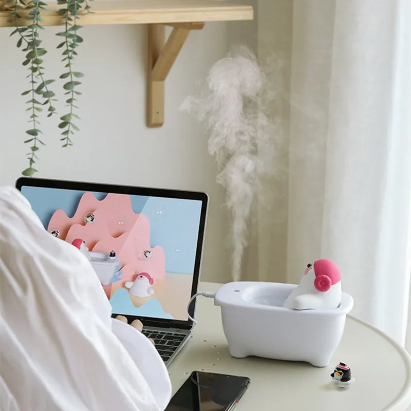 White creative USB air humidifier and aromatherapy diffuser unit on desk