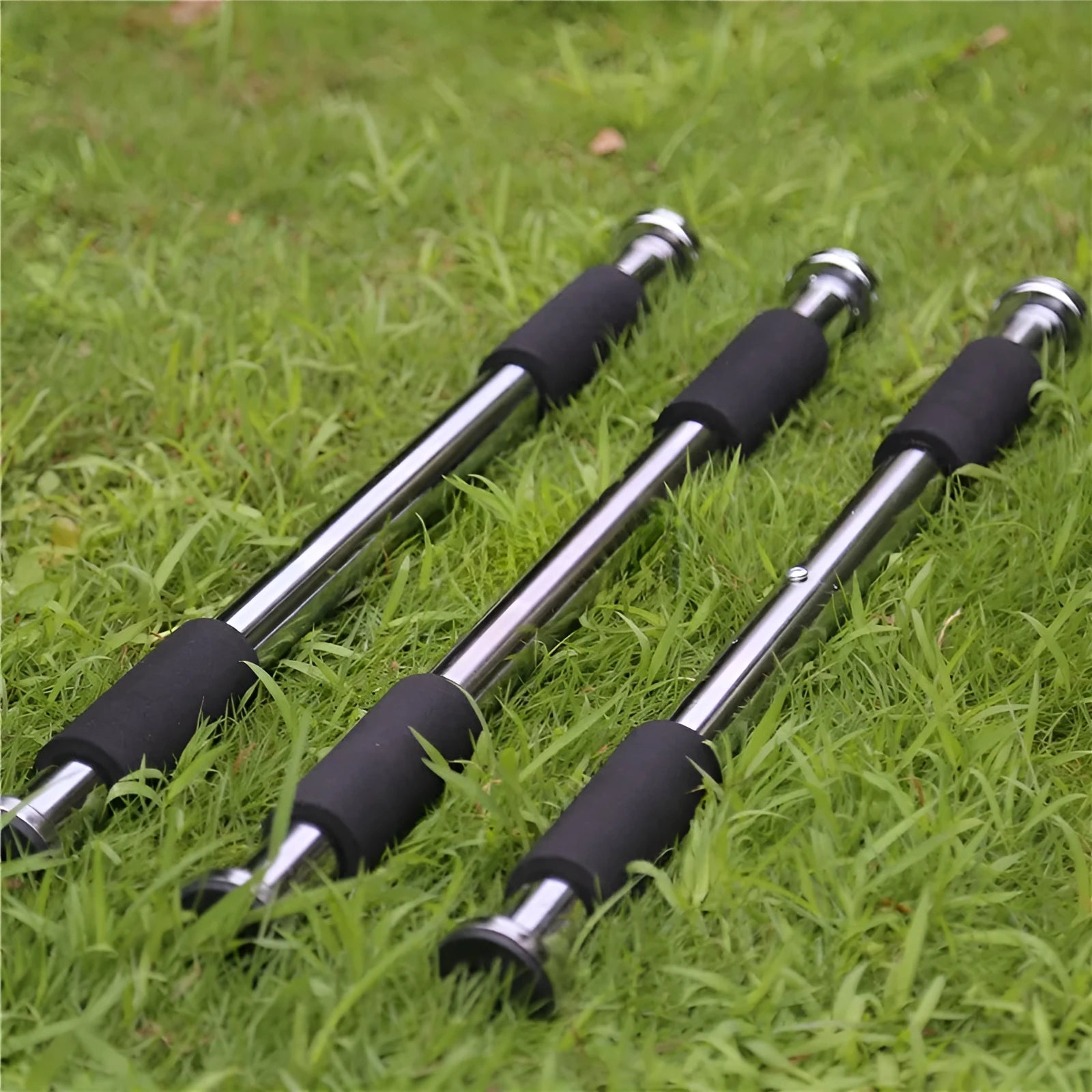 Steel adjustable indoor pull-up bar extended for door frame fitness training.