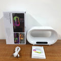 White smart LED desk lamp with wireless charging pad and alarm clock display in 3-in-1 design