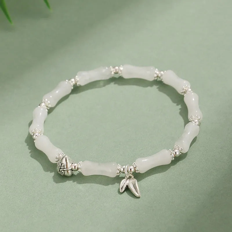 Electroplated bamboo strawberry crystal bracelet for women in green aventurine, showing natural stones on a bracelet.