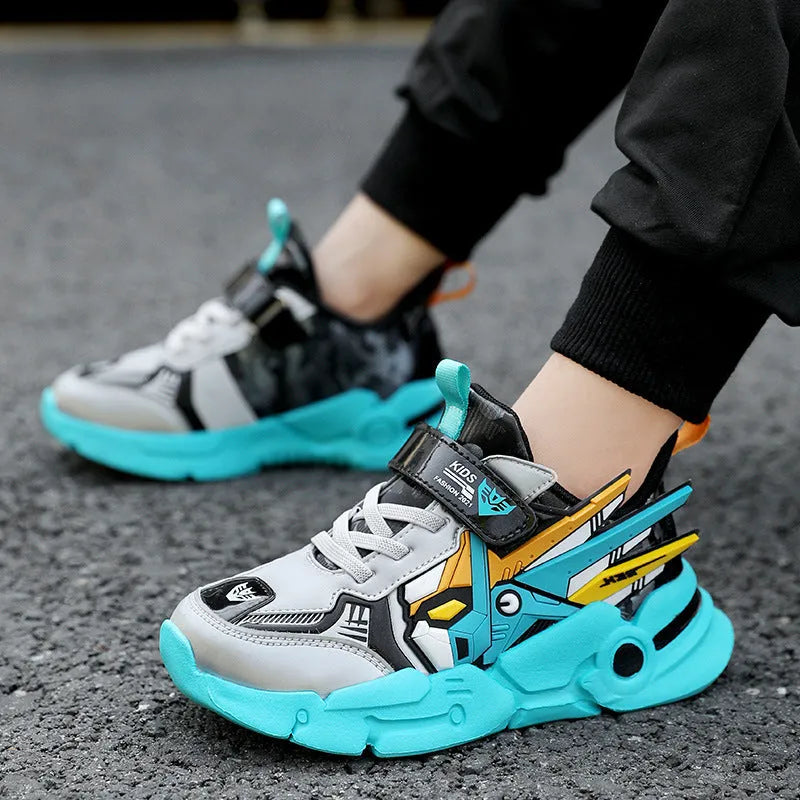 Boys yellow artificial leather sneakers with Velcro strap and cartoon pattern, on a rubber sole.