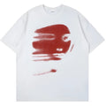 White loose fit cotton t-shirt with short sleeves and a round neck on a hanger