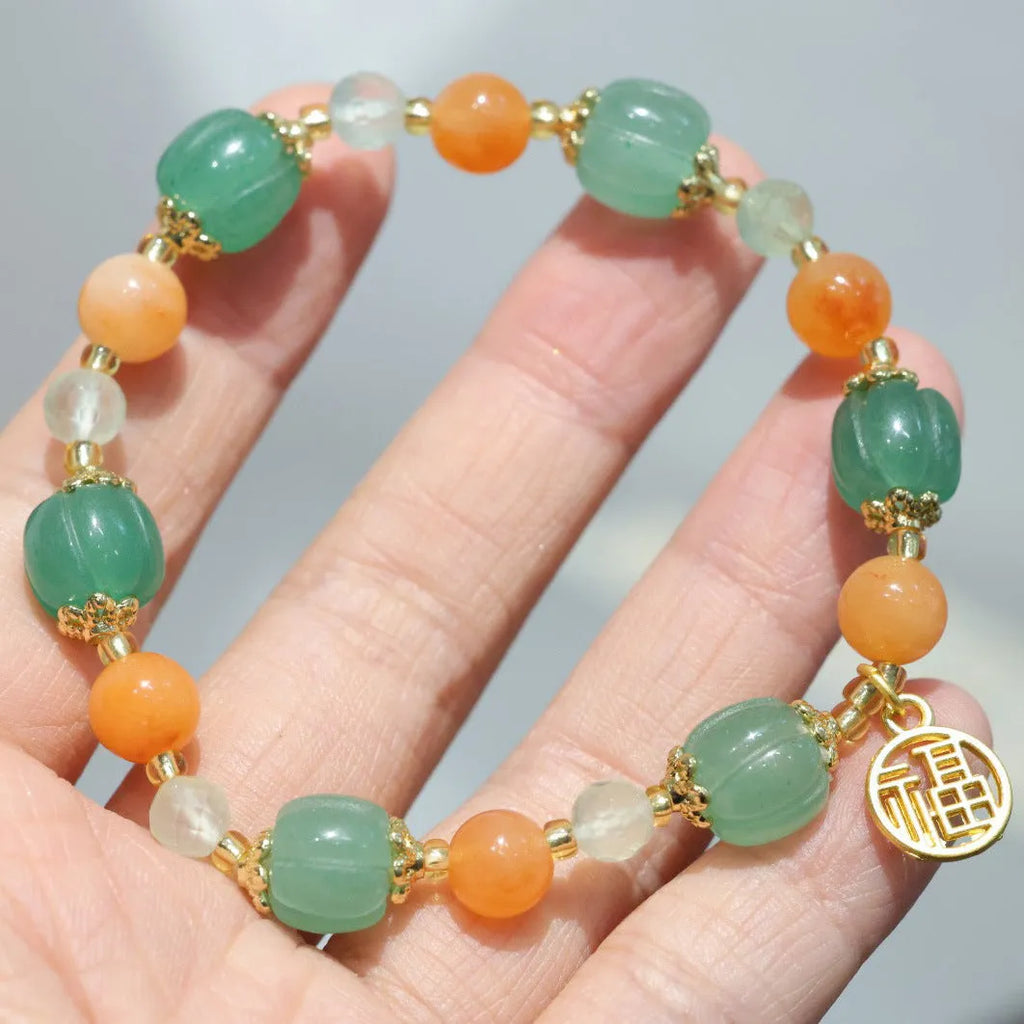 Jinsi Jade Duobao Pumpkin Bracelet with Prehnite stones for a 14-16.5cm wrist.