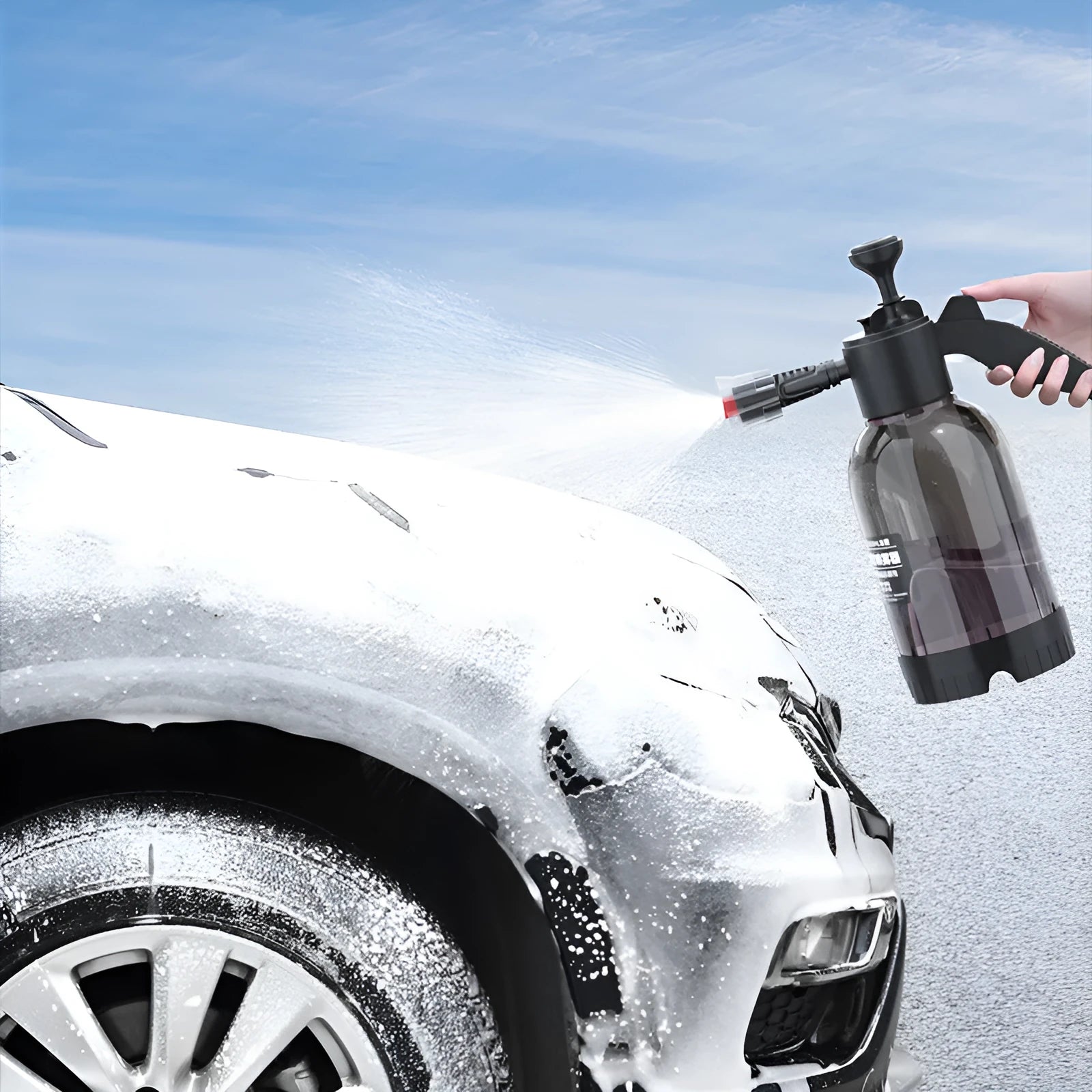 Black hand-held foam sprayer with a 2-litre capacity bottle and pump mechanism.