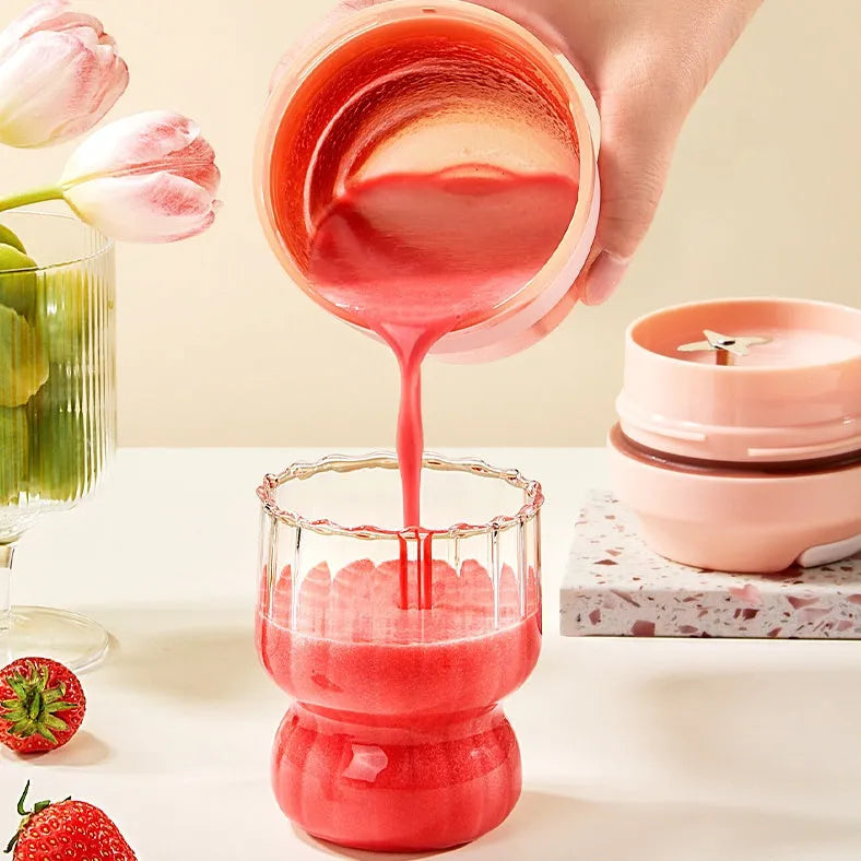 Portable USB rechargeable blender cup in purple, green or orange with 400ml capacity and four stainless steel blades