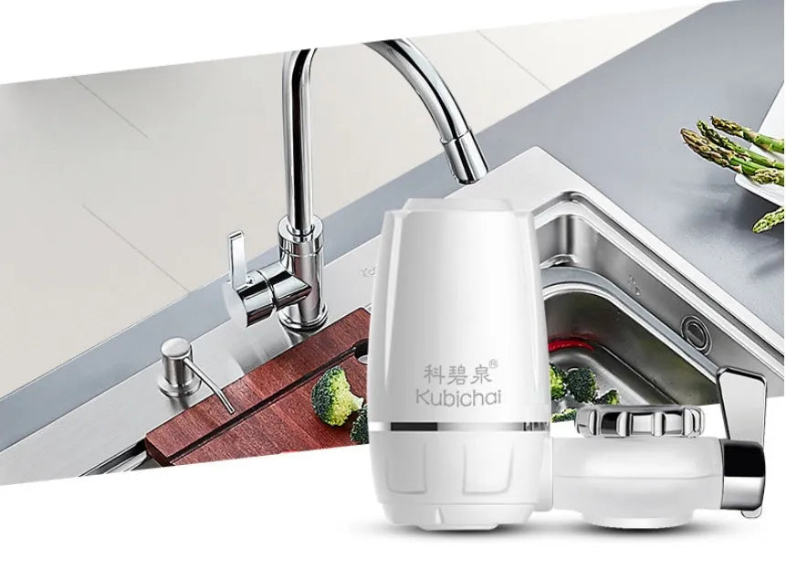 White plastic faucet water filter with switch lever and ceramic cartridge, shown with universal tap adapters.