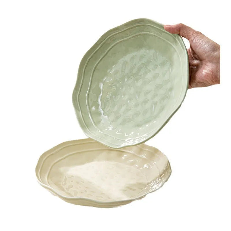 Seven-piece ceramic tableware set in solid colours with modern minimalist design