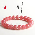 Women's geometric crystal bracelet with Longevity Lock design and red rhodochrosite stone beads.