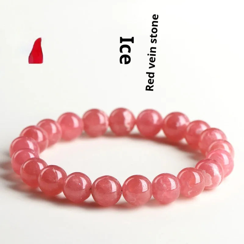 Women's geometric crystal bracelet with Longevity Lock design and red rhodochrosite stone beads.