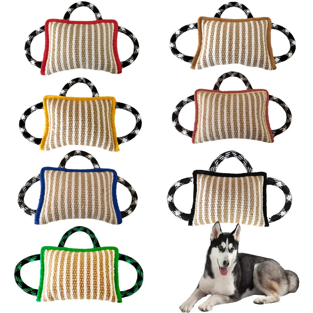 Blue dog tug toy with jute bite pillow and three rope handles for tug of war.