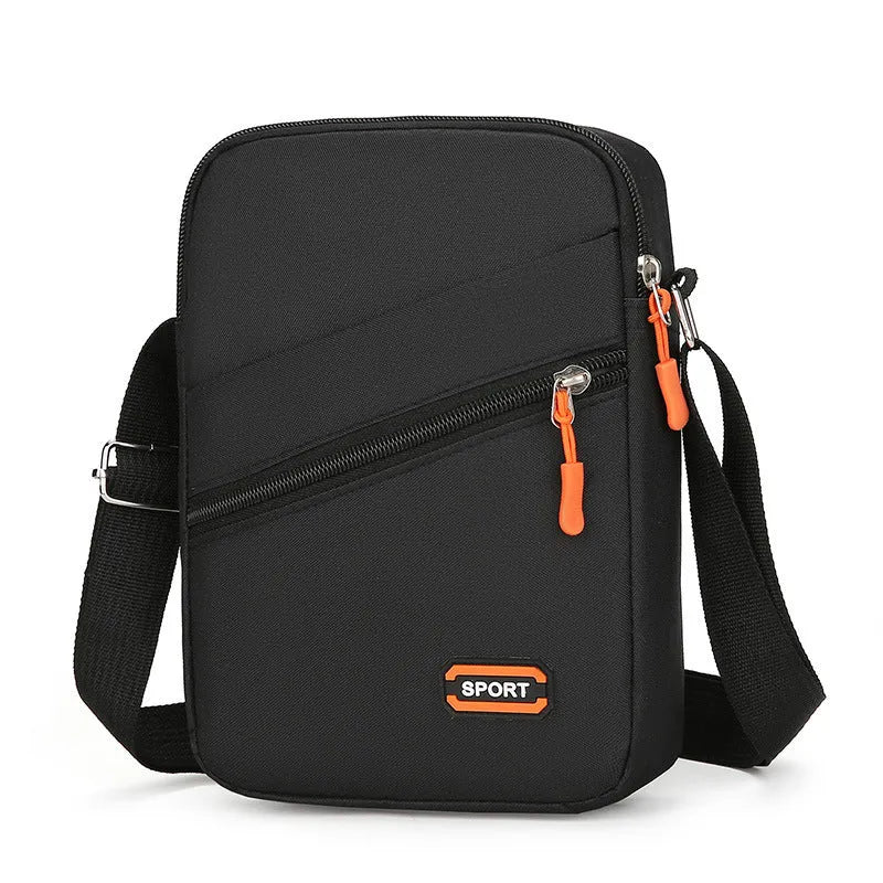 Oxford cloth ultra-light crossbody commuter bag in solid colour with contrasting details.