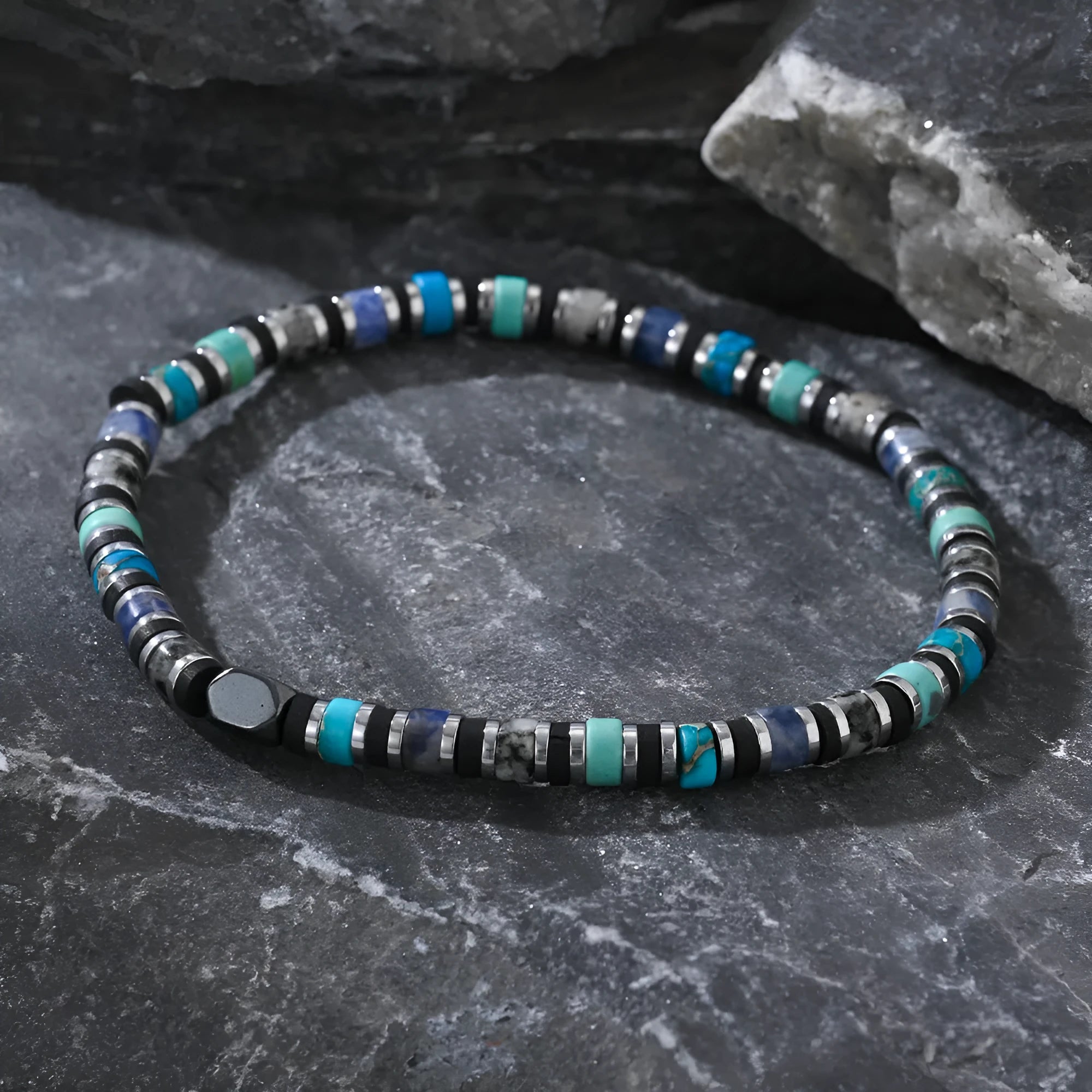 Hand-woven bohemian bracelet with semi-precious stones in geometric cylindrical bead design