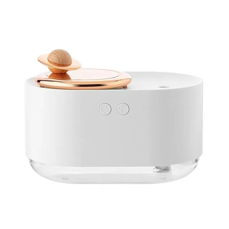 Rotating planet-shaped USB humidifier with night light in green, pink, or white colours.