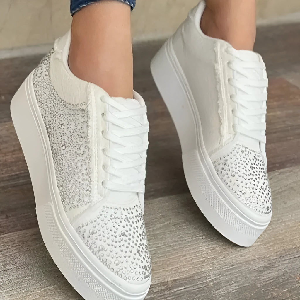 Plus size women's black lace-up casual sports shoes with rhinestone details and a thick flat rubber sole.