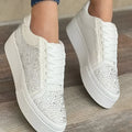 Plus size women's black lace-up casual sports shoes with rhinestone details and a thick flat rubber sole.