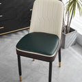 Orange leather horseshoe-shaped seat cushion with non-slip base on a wooden chair.