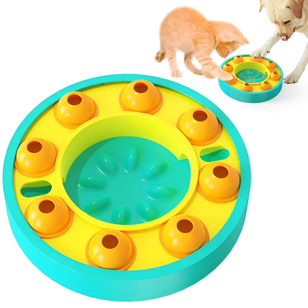 Lake blue interactive dog slow feeder bowl with central column and food turntable on a floor.