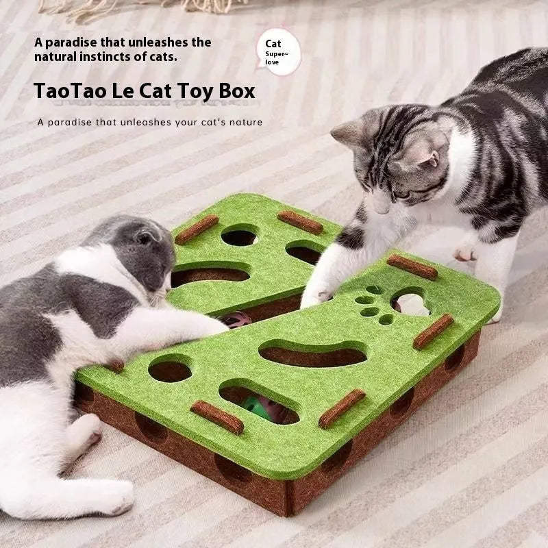 Green brown felt cat toy box with a felt mouse and a white feather ball inside.