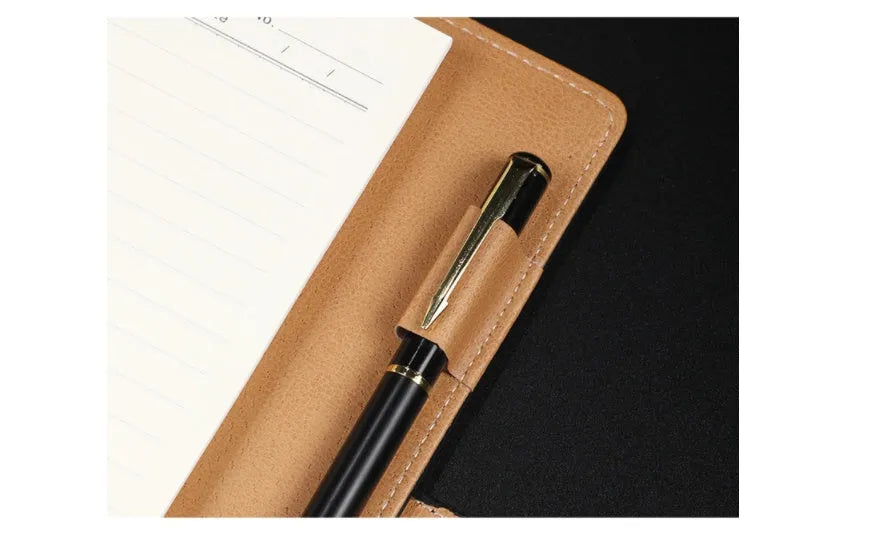 A5 hardcover PU binder notebook with metal buckle clip, shown in multiple colours.