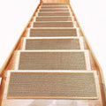 Japanese-style linen-look stair mat in camel colour on a wooden step.