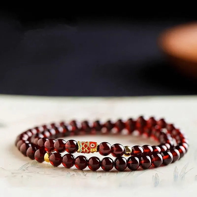 Retro wine red glass bead women's bracelet with garnet accents in New Chinese style design
